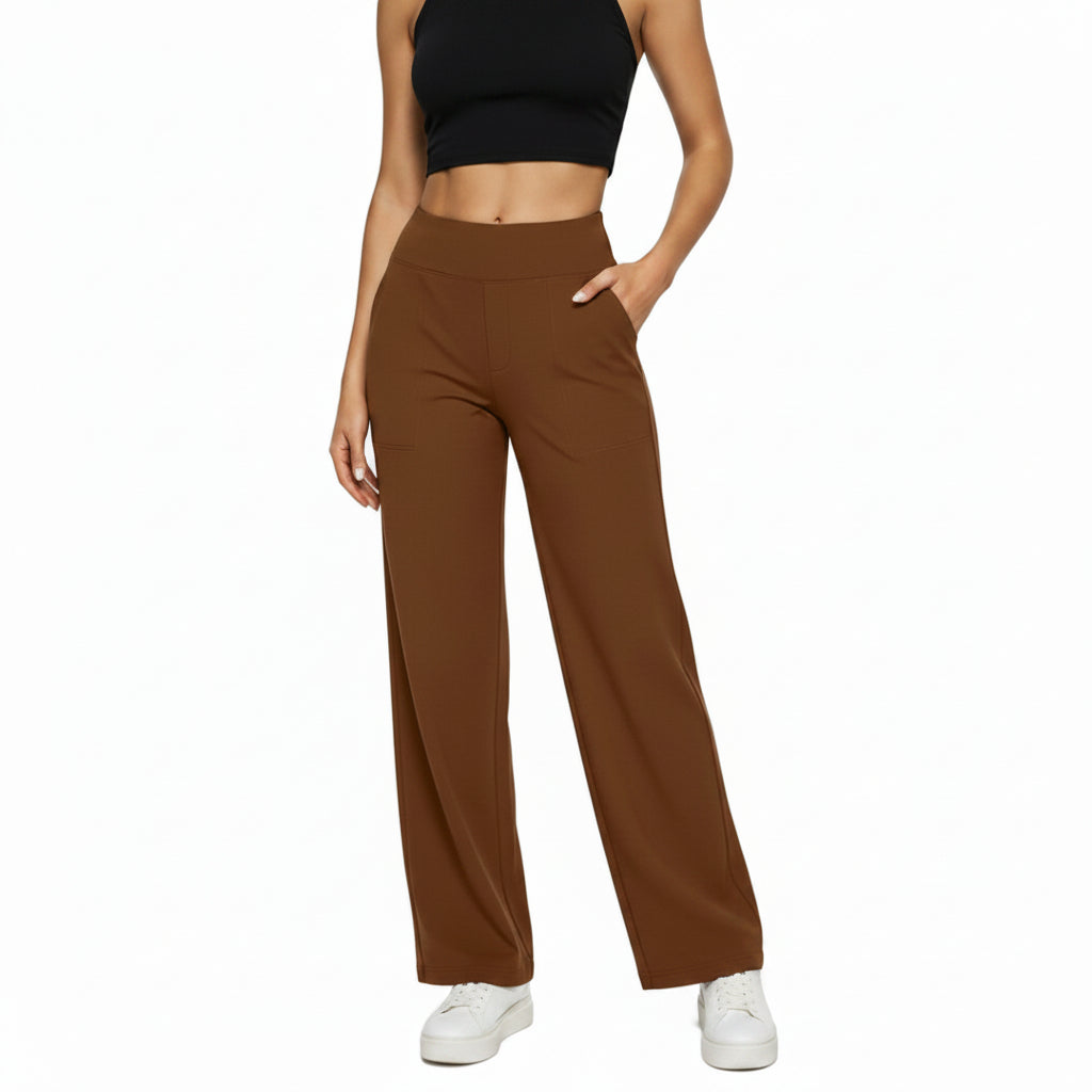 Dames gebreide broek met hoge taille, rechte pijpen en praktische zakken. Comfortabel, elegant en modieus.
