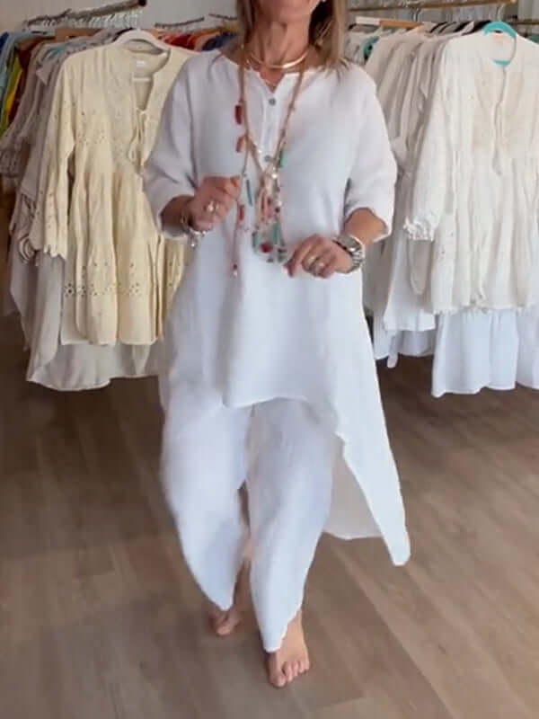 Damespak Wanda: elegant tweeledig pak met wijde pijpen en blazer, ideaal voor kantoor of casual zomerlook.