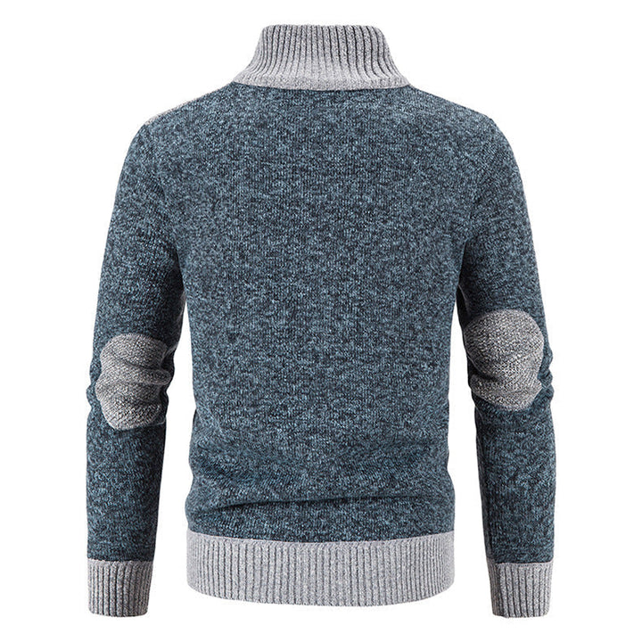 Warm herenvest met hoge kraag, biedt optimaal comfort tijdens koude avonden.