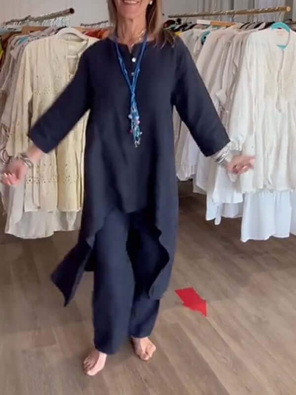 Modieus damespak Wanda, tweedelig met blazer en wijdepijp broek, perfect voor een elegante zomer.