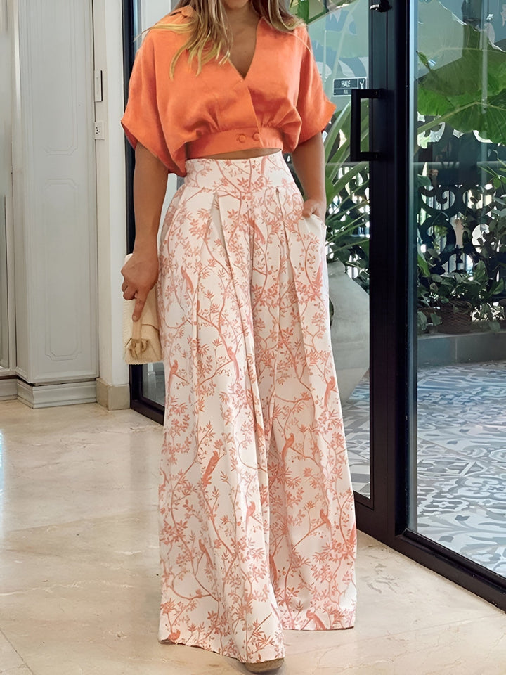 Dames tweedelige zomerset Estelle met elegante blouse en comfortabele wijde broek, perfect voor zomerstijl.