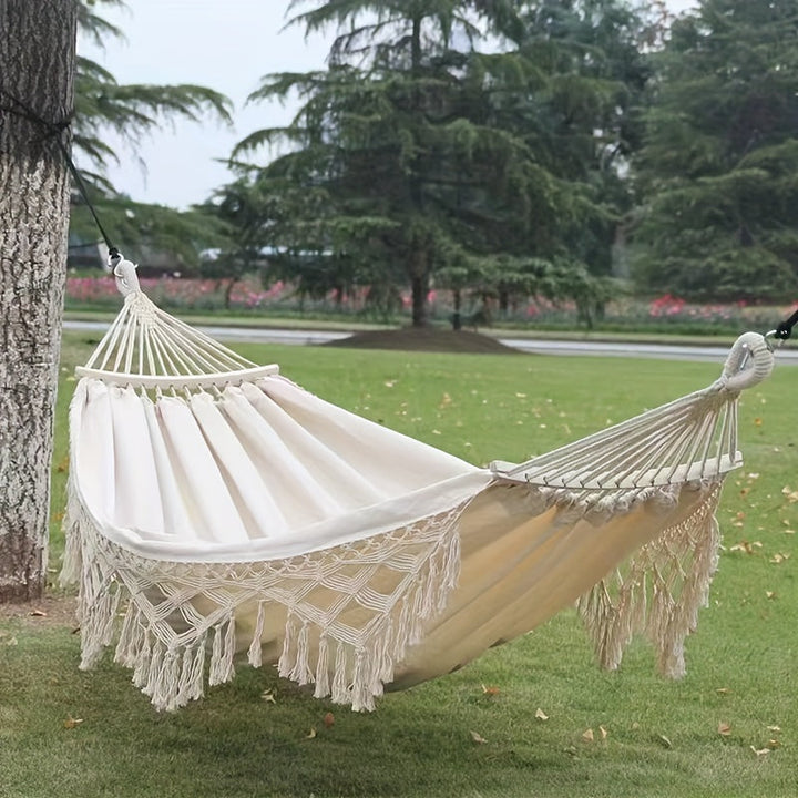 Comfortabele Tusheng dubbele hangmat met vrolijke kwasten, brengt sfeer op je terras of patio.