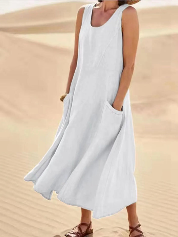 Elegante mouwloze zomerjurk met zakken, A-lijn model voor een flatterende pasvorm.