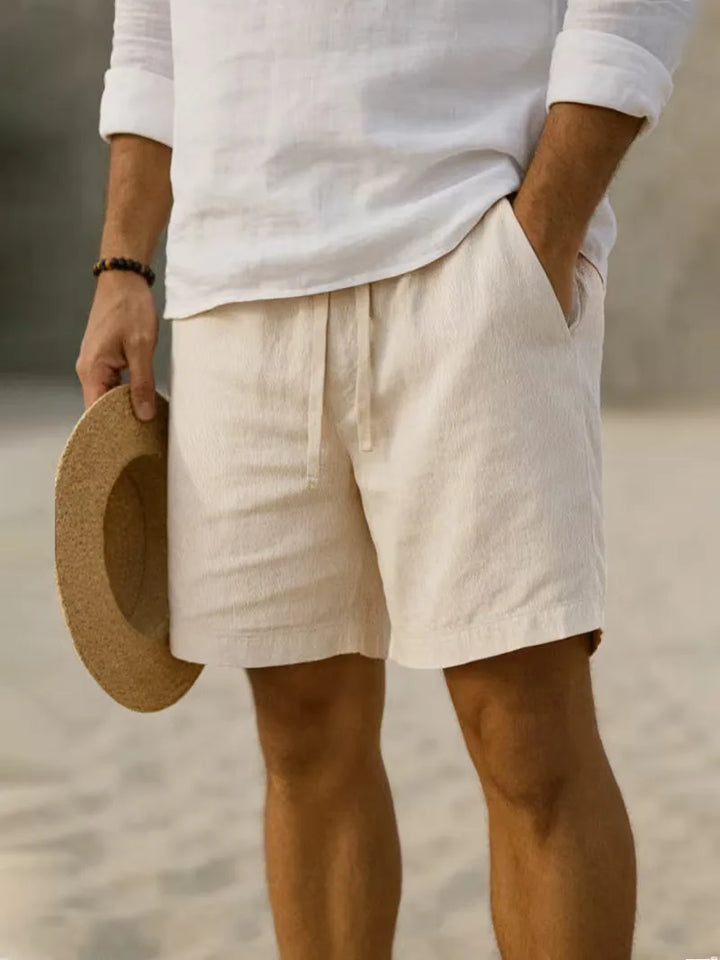 Heren plissé shorts in wit, met elastische tailleband voor een ontspannen zomerdag.