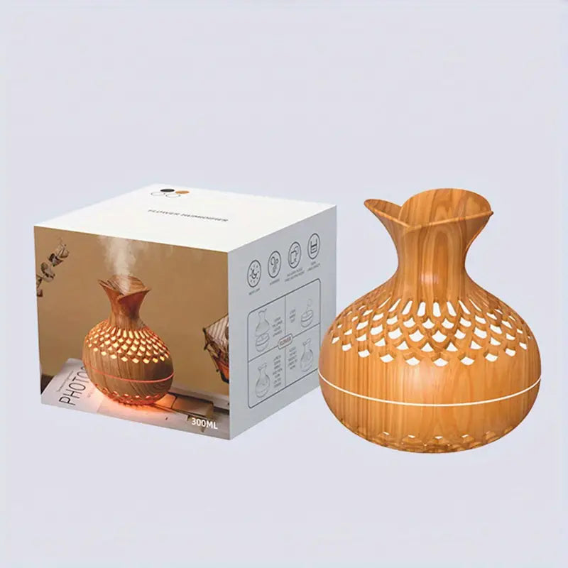 AromaBloom diffuser met zacht sfeerlicht, essentieel voor een moment van pure ontspanning en aromatherapie.