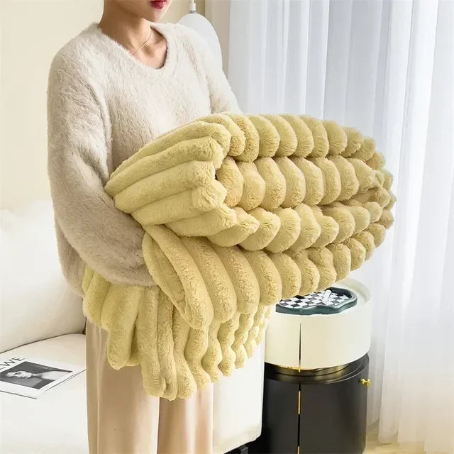 Extra zachte pluche deken, ideaal als warme bankdeken of decoratie voor een knus interieur.