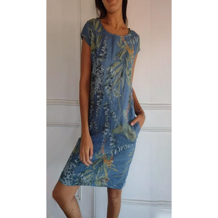 Elegante synthetische damesjurk, modieus en comfortabel. Perfecte midi jurk voor elk seizoen.