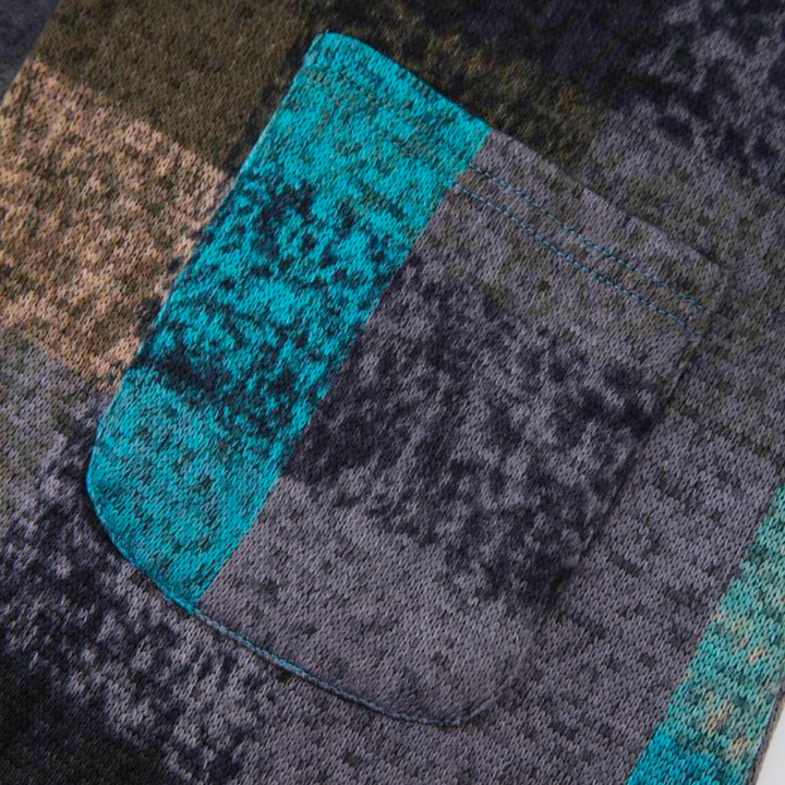 Stijlvol kleurrijk dames vest met capuchon. Comfortabele warme mode voor de koude seizoenen.