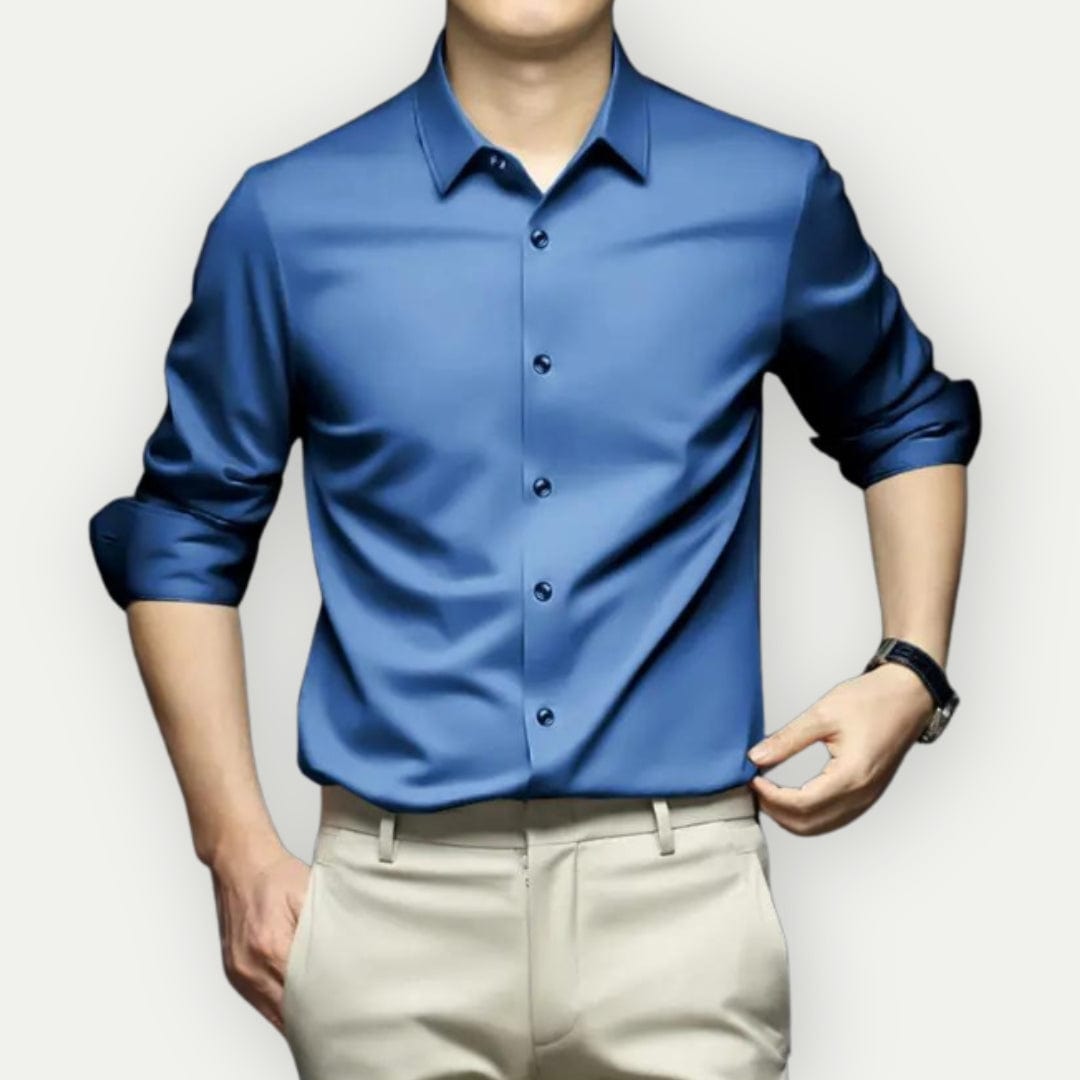 Donkerblauw herenoverhemd, slim fit, strijkvrij en kreukvrij, met elegante knopen.
