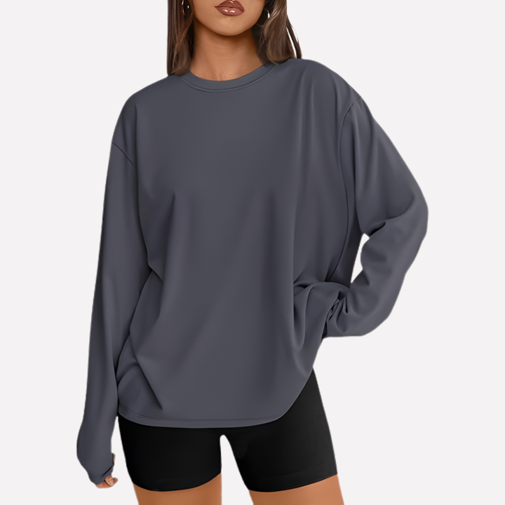 Zwart oversized dames shirt met lange mouwen, stijlvol en ontspannen, ideaal voor dagelijkse mode.