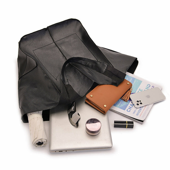 Praktische handtas voor dames, vintage look, oversized en ruim, veelzijdig accessoire.
