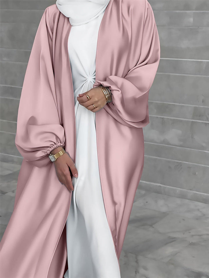 Dames elegante abaya jurk met riem, creëert een flatterend silhouet. Stijlvolle en veelzijdige lange jurk.