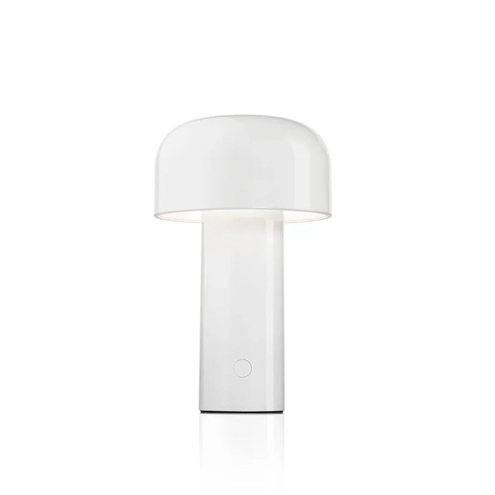 Moderne Luminor LED tafellamp met draadloos design en driekleurige dimfunctie voor sfeer.