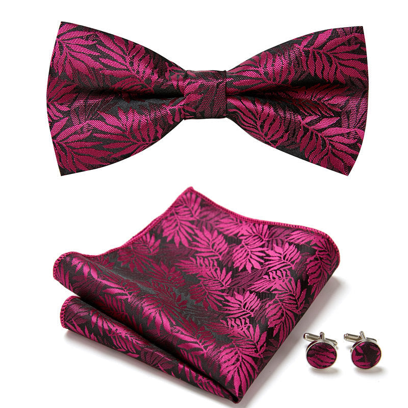 Dubbele heren vlinderstrikset met bloemenpatroon, pochet en manchetknopen. Een stijlvol heren accessoire cadeau.