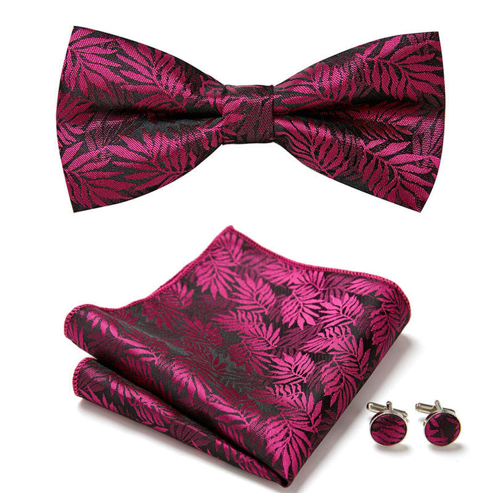 Dubbele heren vlinderstrikset met bloemenpatroon, pochet en manchetknopen. Een stijlvol heren accessoire cadeau.