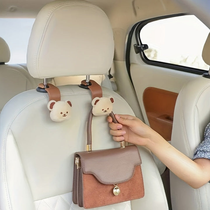 Set van 2 autohaken met schattig berenmotief voor het organiseren van je auto-interieur, perfect voor onderweg.