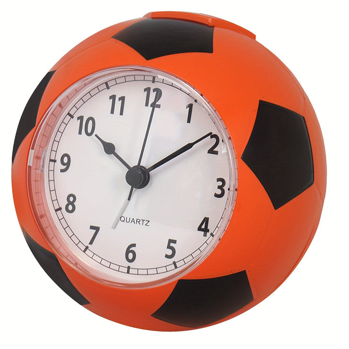 Voetbalvormige kinderwekker met muzikaal alarm; een vrolijke start van de dag.