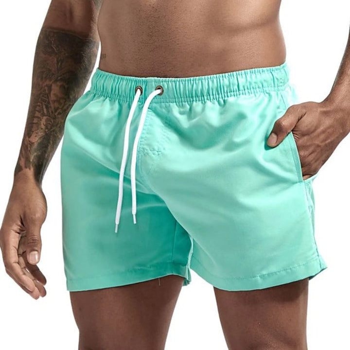 CJ26 heren zomer strandshorts, losse pasvorm, ademend, verkrijgbaar in diverse pastelkleuren.