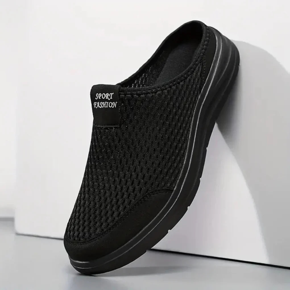 Zwarte heren orthopedische instapsandalen met voetondersteuning voor ultiem comfort en dagelijks gebruik.