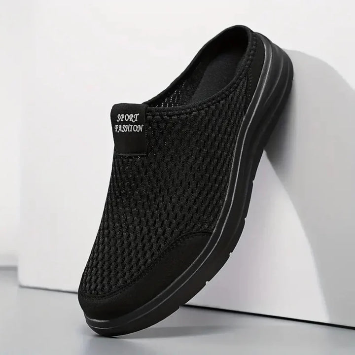 Zwarte heren orthopedische instapsandalen met voetondersteuning voor ultiem comfort en dagelijks gebruik.