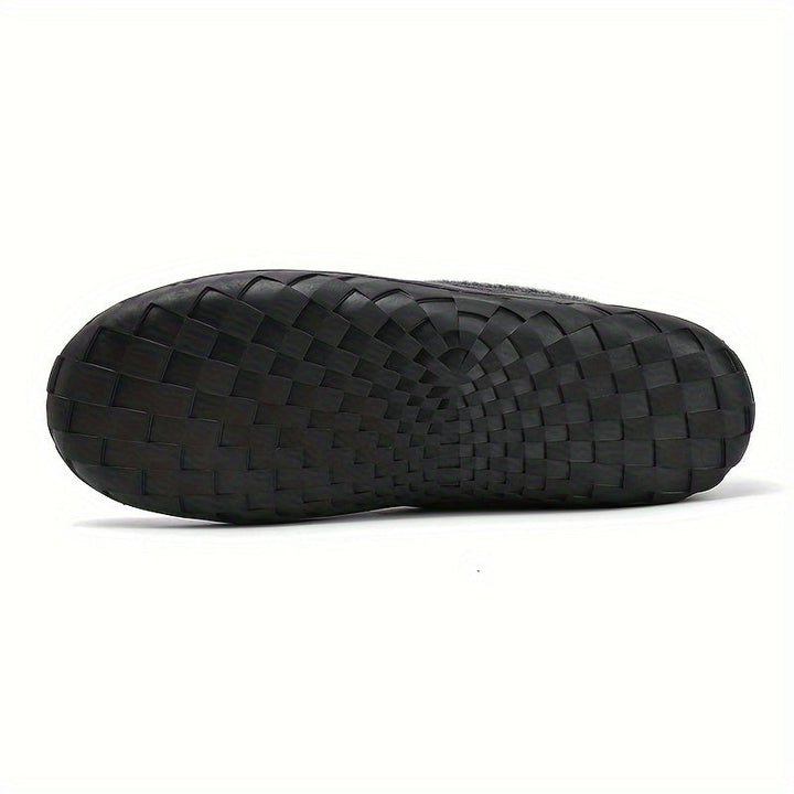 Stijlvolle heren huispantoffels, loafers model, voor ontspanning en warmte in de winter.