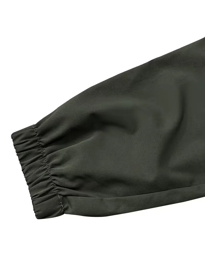 Heren casual jogger cargo broek, taps toelopend, met elastische boorden voor een sportieve streetwear uitstraling.
