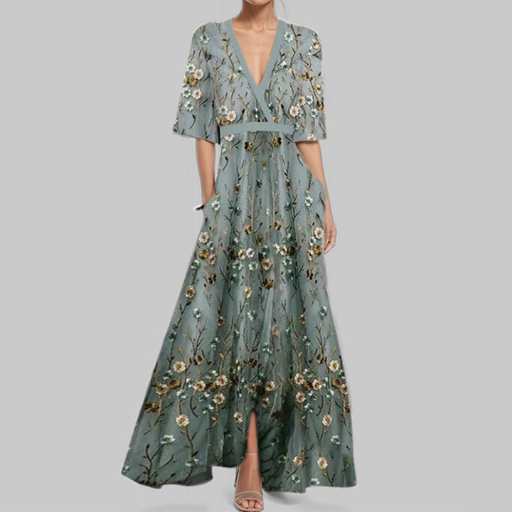Trendy dames zomerjurk met chique bloemenprint, korte mouwen en ceintuur. Een must-have voor de zomer!