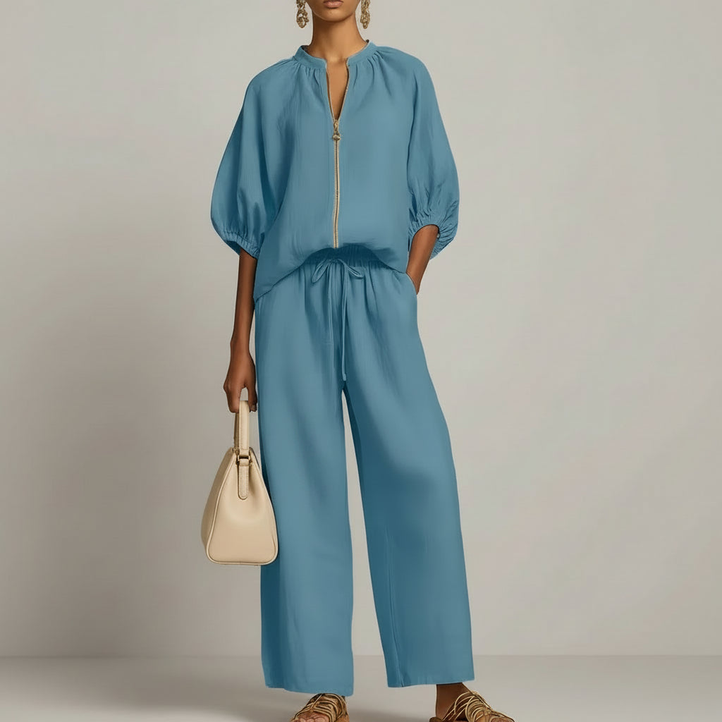Stijlvolle dames broekset met wijde pijpen en trendy top met rits, comfortabel en modieus voor dameskleding.