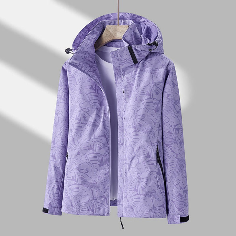 Modieuze dames waterdichte en winddichte outdoorjas met capuchon, geschikt als regen- of lentejas.