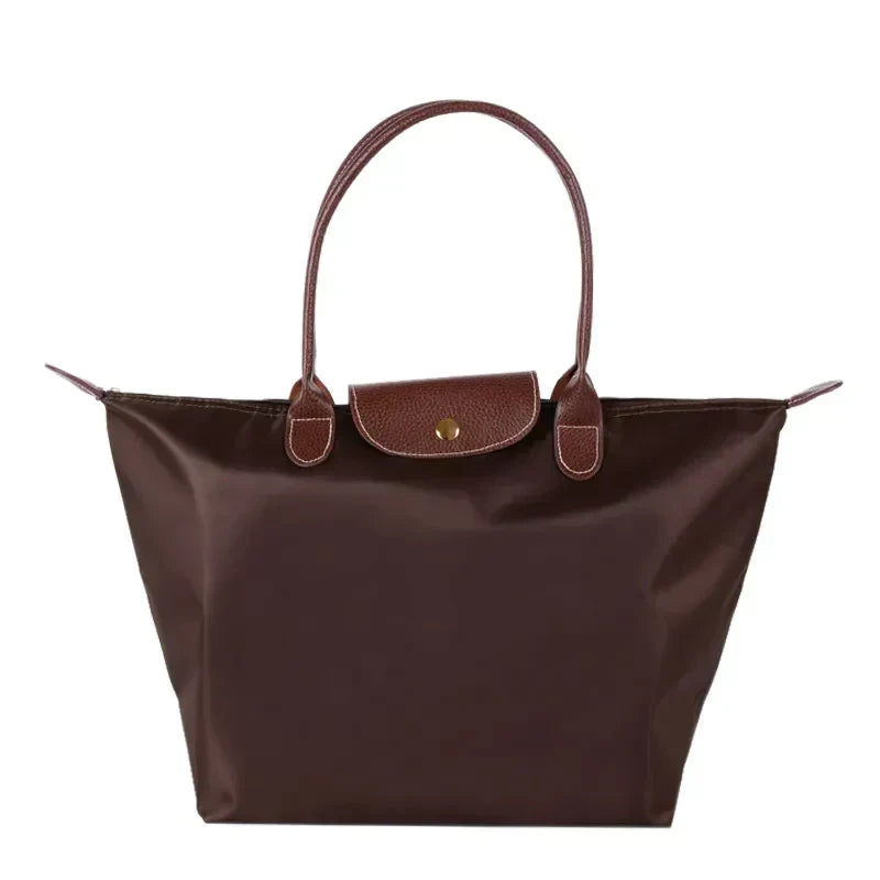 Celeste handtas draagtassen, veelzijdig te stylen als schoudertas, shopper of elegante werktas.