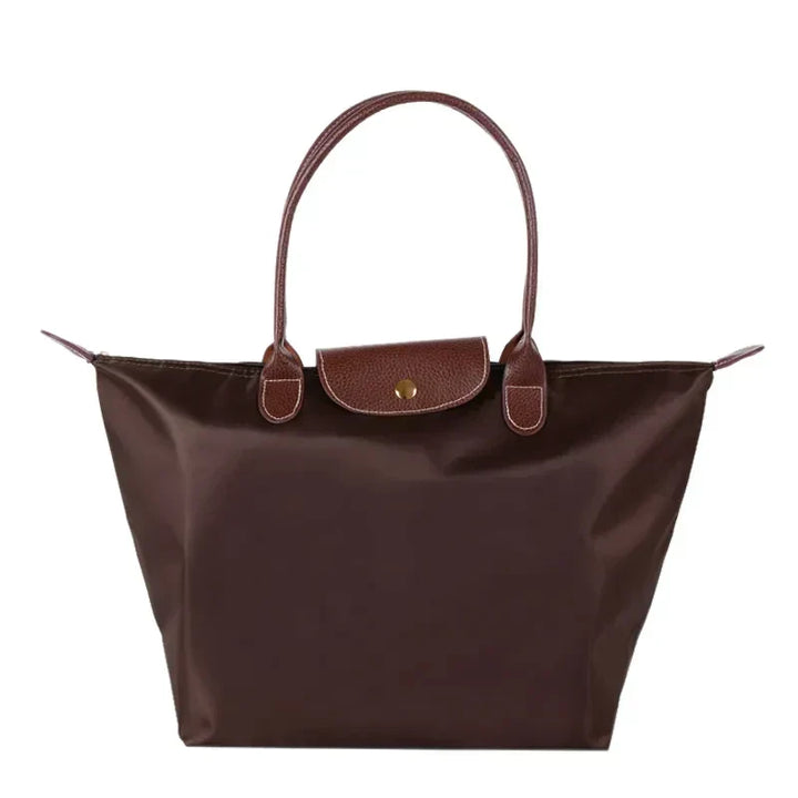 Celeste handtas draagtassen, veelzijdig te stylen als schoudertas, shopper of elegante werktas.
