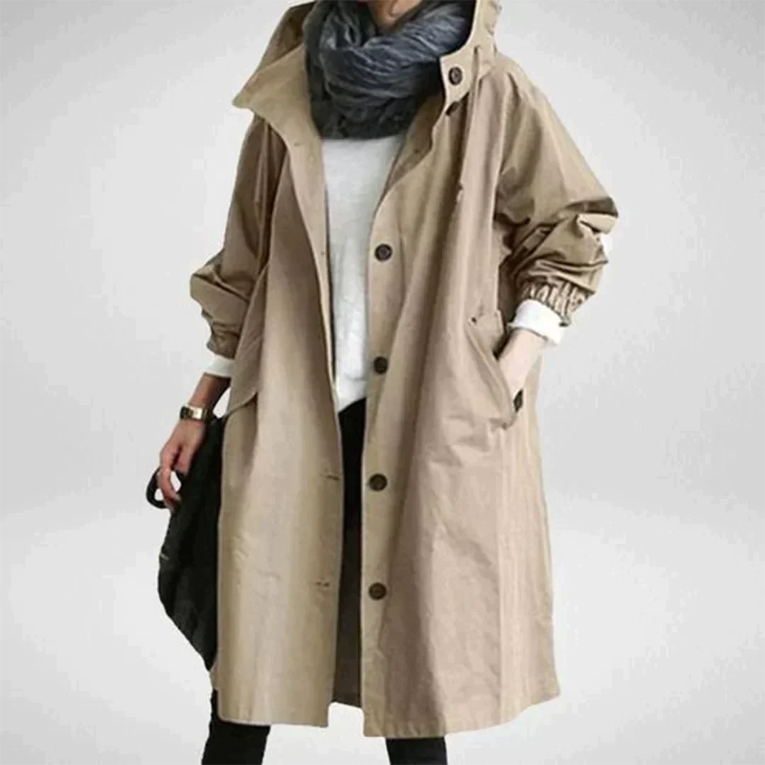 Modieuze dames regenjas van hoogwaardig waterdicht materiaal. Chique lente- of herfstjas voor comfort en stijl.