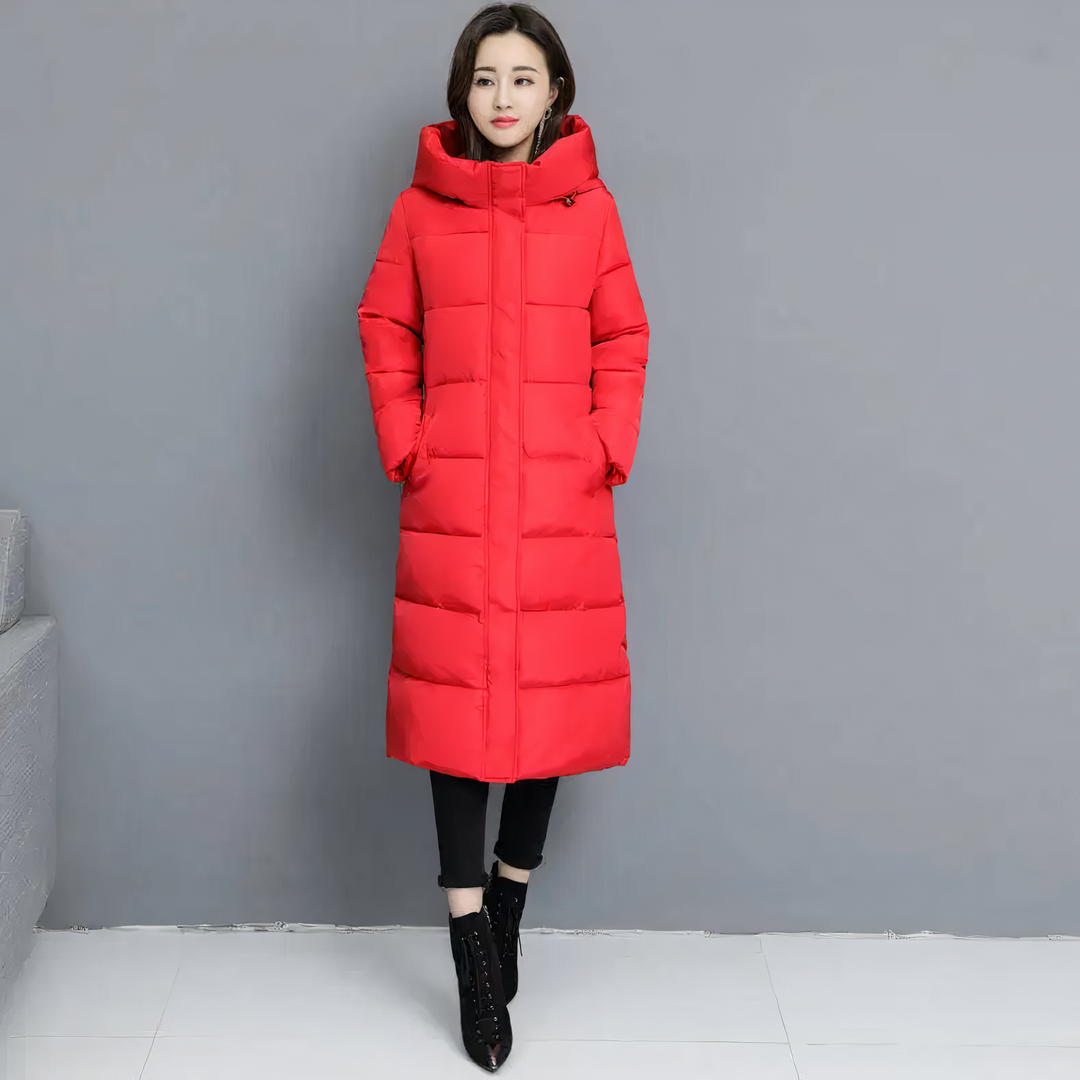 Stijlvol lang gewatteerd damesjack in zwart, warm en comfortabel voor winter, perfect als modieuze bovenkleding.