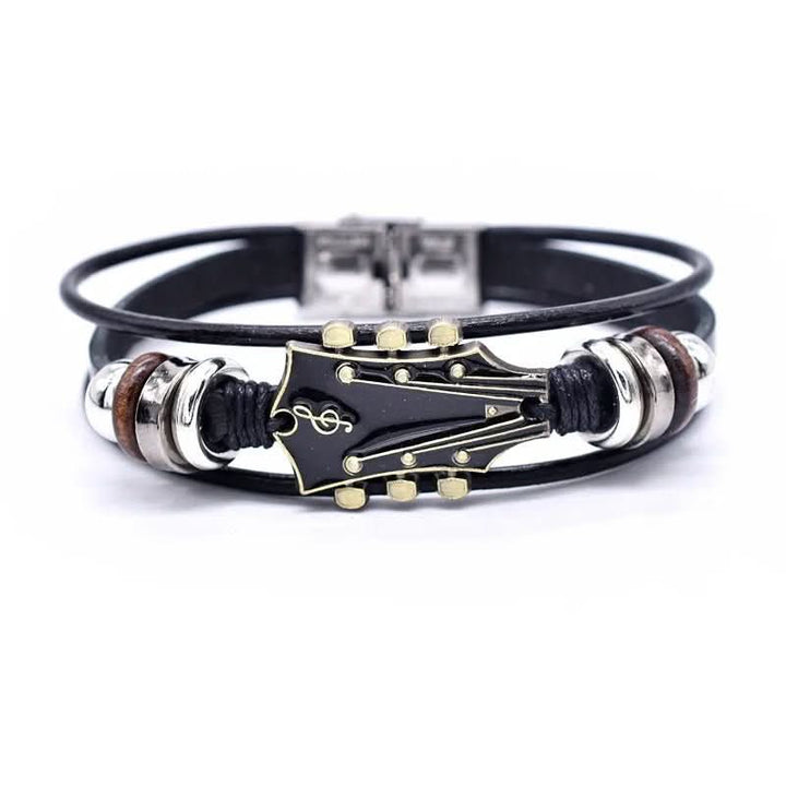 Leren gitaar armband als perfect cadeau voor muzikanten en gitaarliefhebbers. Unisex en verstelbaar.