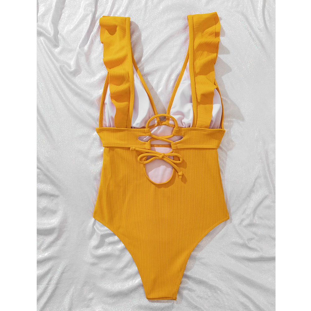 Boho dames badpak, zachte comfortabele stof, met speelse ruches en v-hals. Trendy zwemkleding voor vrouwen.