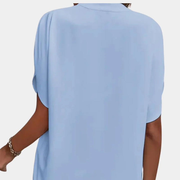 Hoymans casual damesblouse. Stijlvolle en comfortabele zomerkleding met een luchtige, losse pasvorm.