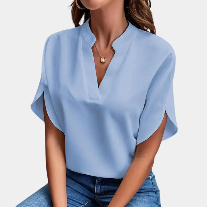 Luchtige en elegante Hoymans zomerblouse voor dames. Comfortabele pasvorm, perfect voor een modieuze look.
