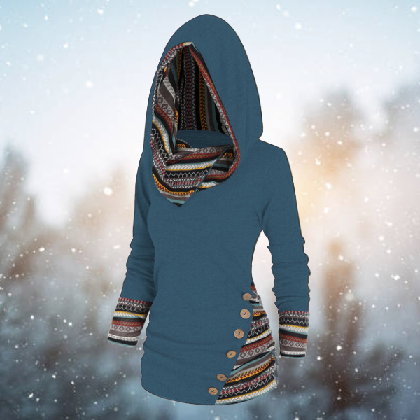 Model draagt Naïma dames hoodie met geometrisch patroon, toont comfortabele pasvorm en casual stijl van de capuchontrui.