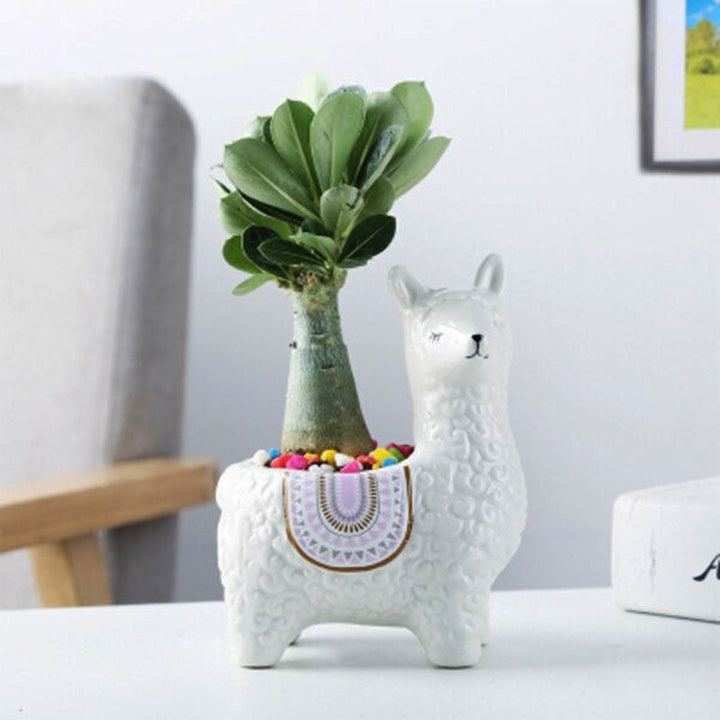 Woondecoratie: alpaca bloempot voor binnenplanten, een vrolijke toevoeging.