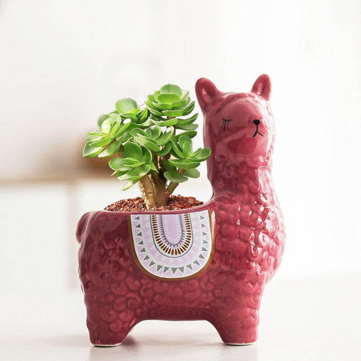 Gedetailleerde porseleinen alpaca bloempot, handgemaakt voor plantenliefhebbers.
