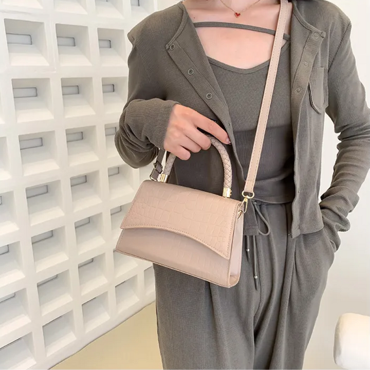 Veelzijdige dames tas: handtas, schoudertas of crossbody. Gemaakt van elegant zwart PU leer.