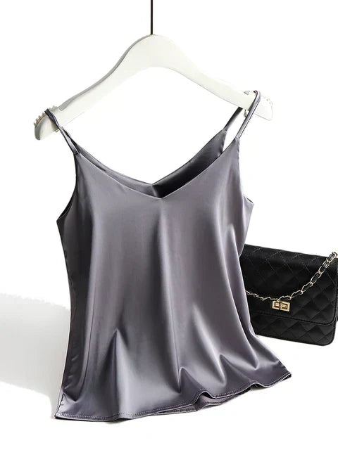 Elegante dames top met spaghettibandjes. Comfortabele, glanzende basic voor zomer en casual chic.