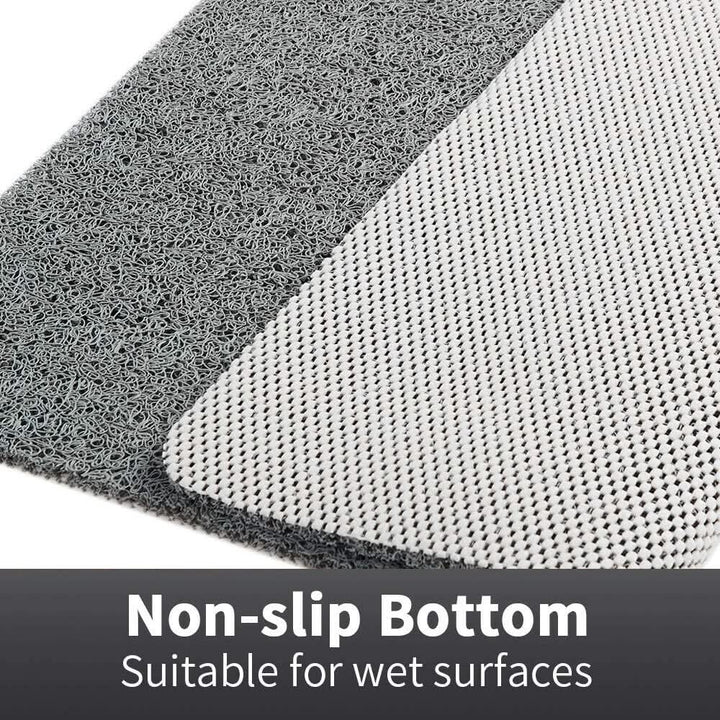 Veilige antislip douchemat in badkameromgeving, met ingebouwd afvoersysteem voor optimale hygiëne en comfort.