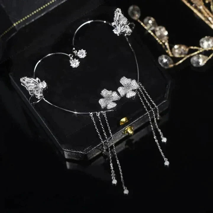 Verzilverde vlinder oor manchet voor dames, geen piercing nodig. Trendy sieraad dat elegantie toevoegt aan elke outfit.