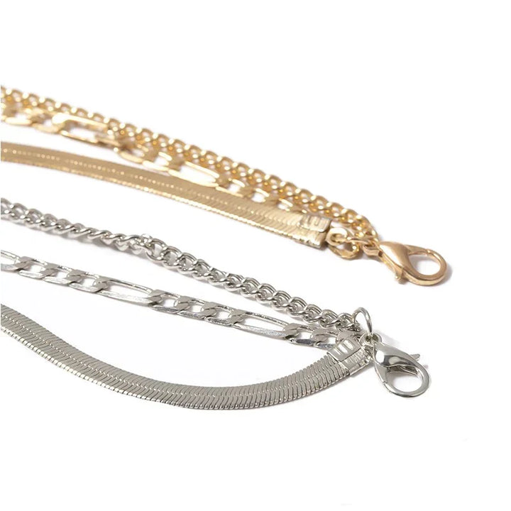Close-up van de 3-delige damesarmband set, gedetailleerd sieraad. Subtiele elegantie voor vrouwen.