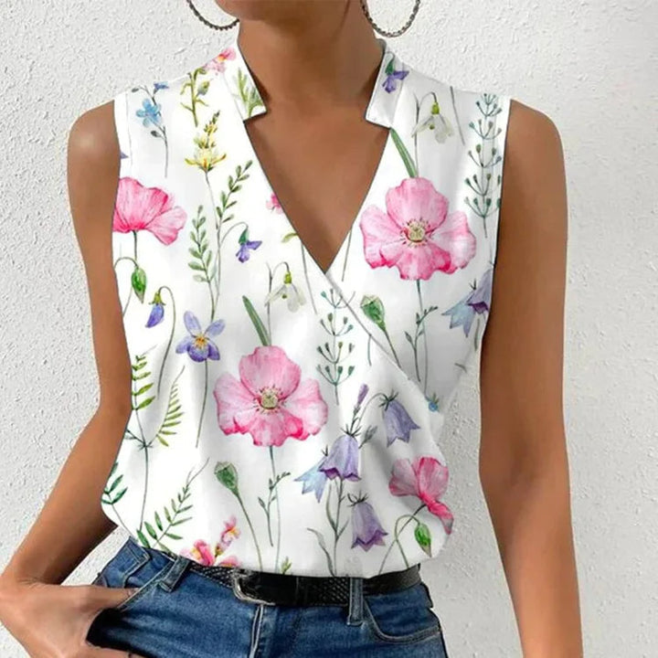 Casual-elegante mouwloze top voor dames, met verfijnde V-hals en levendige bloemenprint, perfect voor elke outfit.