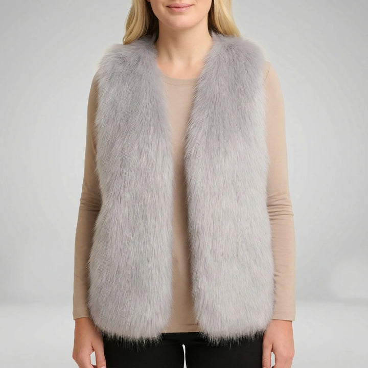 Warm en comfortabel bontlook dames gilet, een mouwloze bodywarmer ideaal voor koude dagen in de herfst/winter.