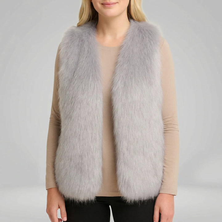 Luxe dames gilet met bontlook, mouwloos en elegant. Deze Tahlia bodywarmer is een warme toevoeging aan elke garderobe.