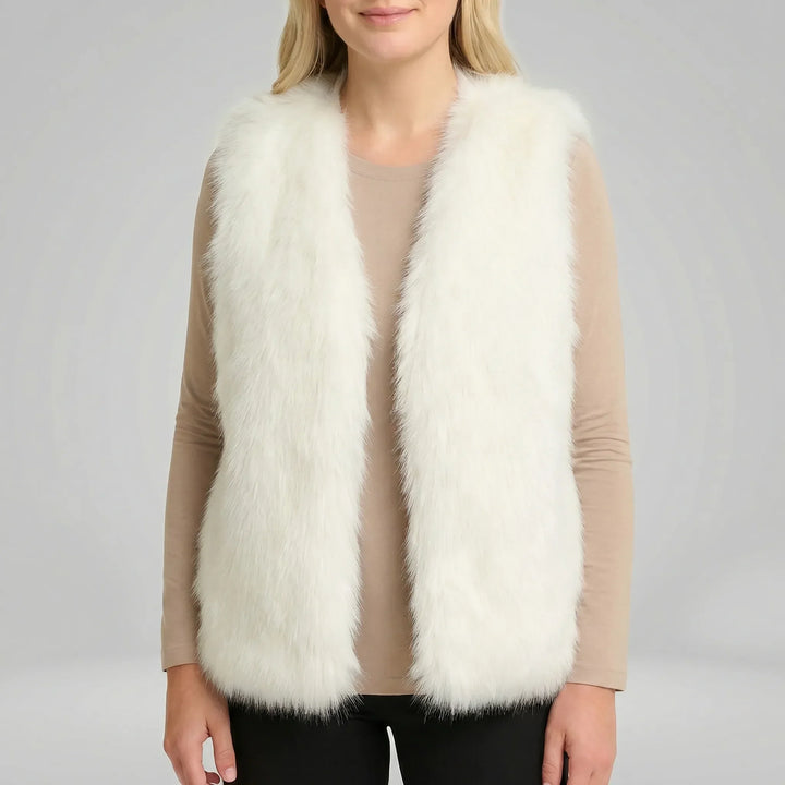 Dames mouwloos gilet Tahlia met elegante bontlook, comfortabel en warm. Essentieel voor herfst- en winteroverkleding.