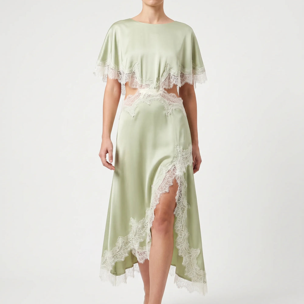 Trendy dames asymmetrische midi jurk in lichtgroen met comfortabele vleermuismouw. Ideaal als feest- of avondjurk.